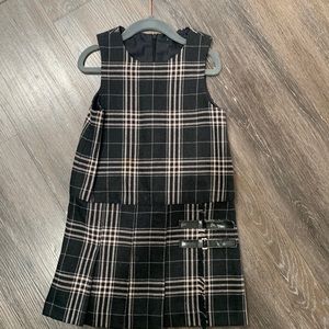 Beautiful, pleated dress with leather trimming